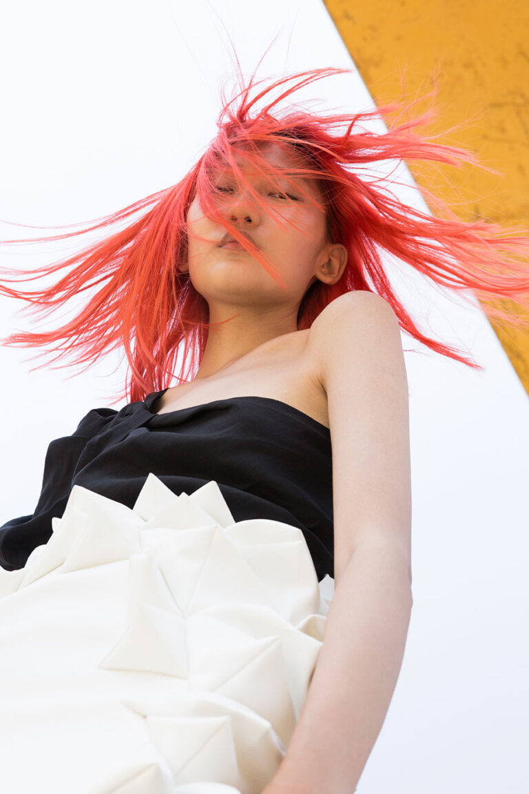 Model wearing a polyhedron skirt.